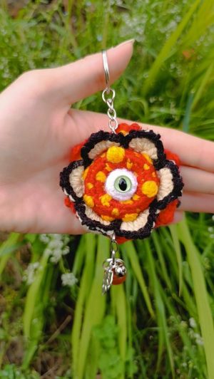 Porte-Clés Fleur Mandala Creepy à l'Œil , fleur mandala crochetée main , acrylique , Boutons